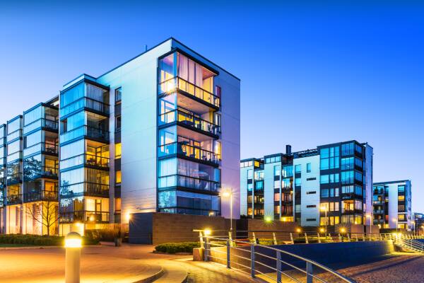 Evening outdoor urban view of modern real estate homes