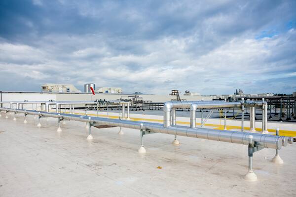 air handling tubes on the roof of a commercial space